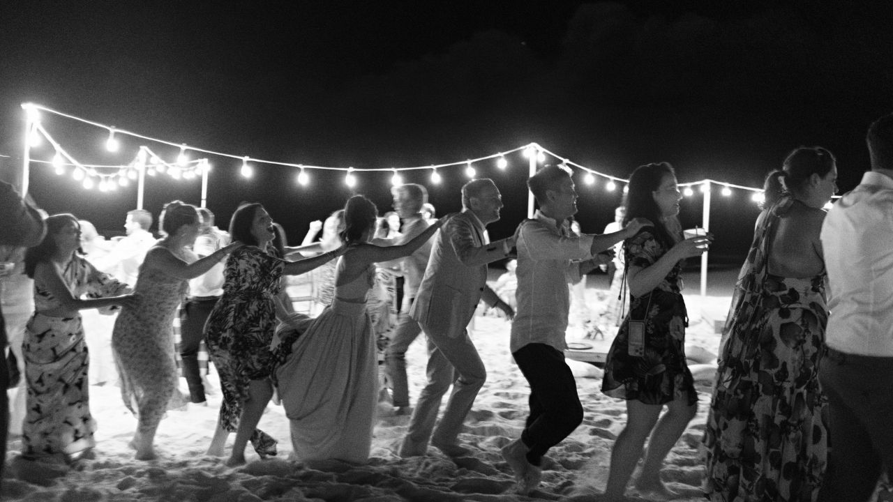 photo of wedding guests dancing for a destination wedding