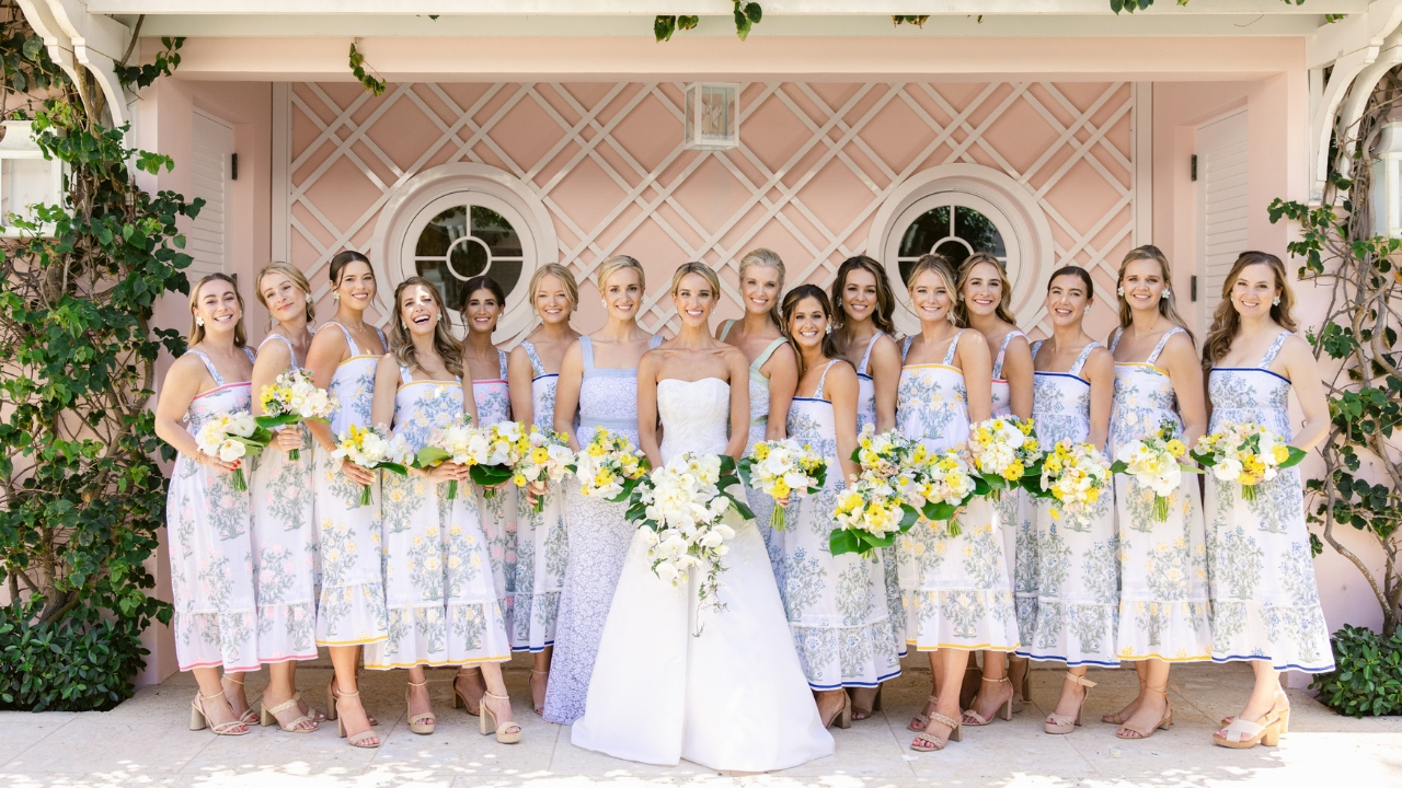 photo of bride and her bridesmaids posing for photo