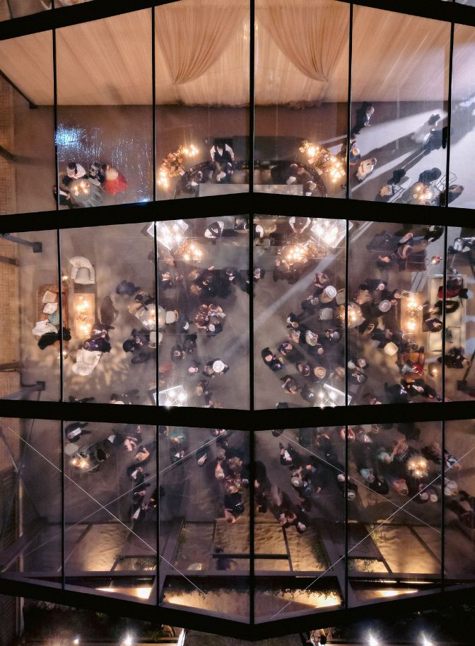 photo of overhead view of reception from glass ceiling