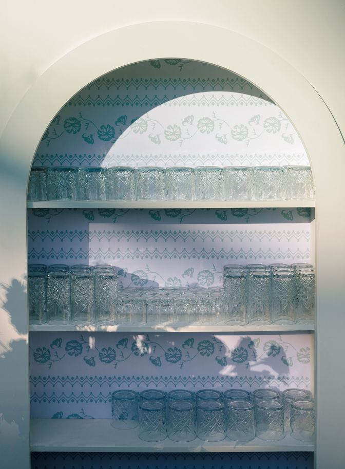 photo of glasses displayed at bar for wedding reception